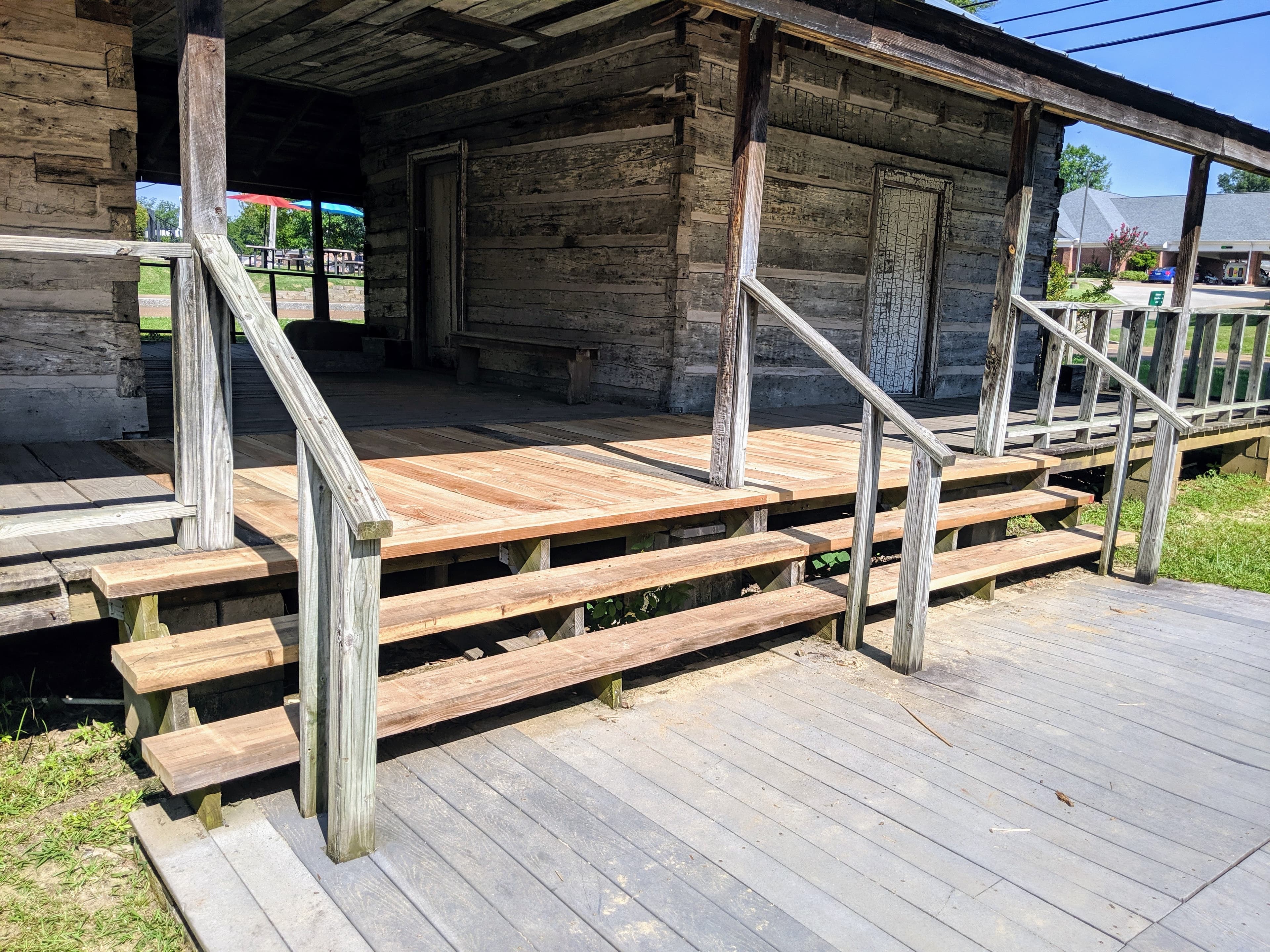 Weathered log cabin on the grounds of the DeSoto County Museum