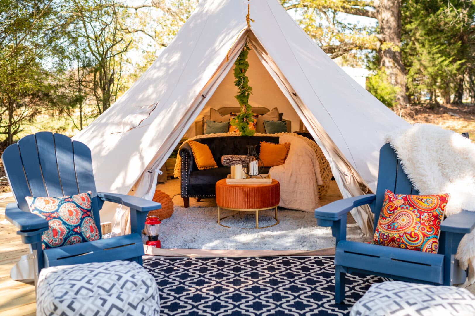 Luxury glamping bell tent with outdoor seating at Blue Haze Farms in Nesbit